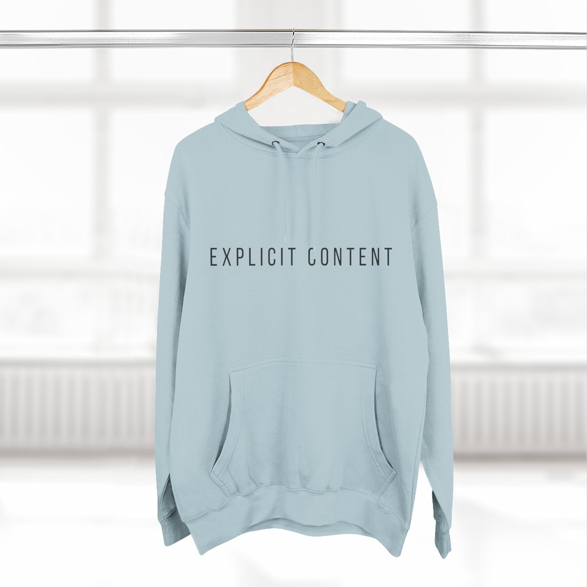 Light Blue fleece pullover hoodie with drawstring hood and “EXPLICIT CONTENT” front print