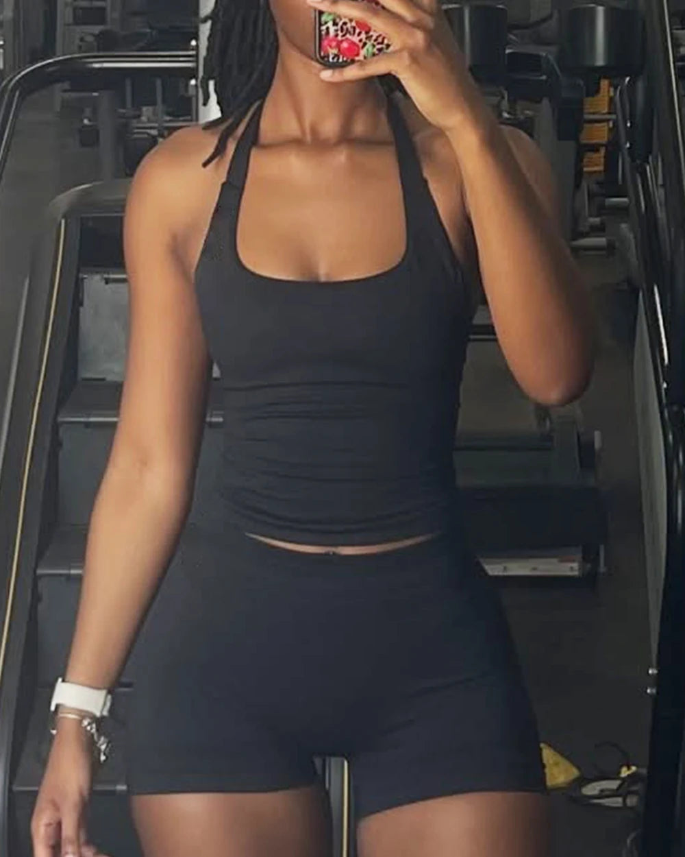 Xooie Fit compression halter tank top for women in black, perfect for workout sessions and active wear