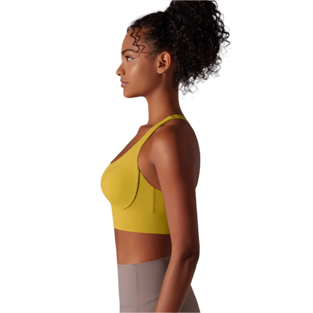 Mustard yellow active sports bra, side view with smooth fabric