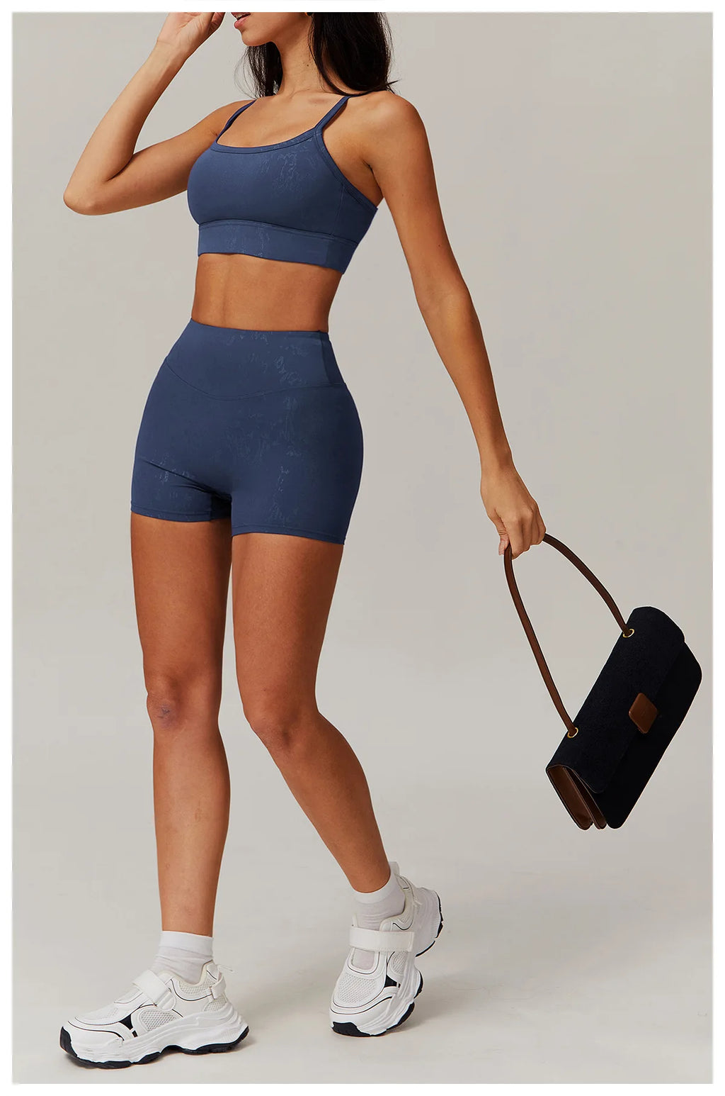 Mead Blue spaghetti-strap crop top and high-waisted shorts active set, front view
