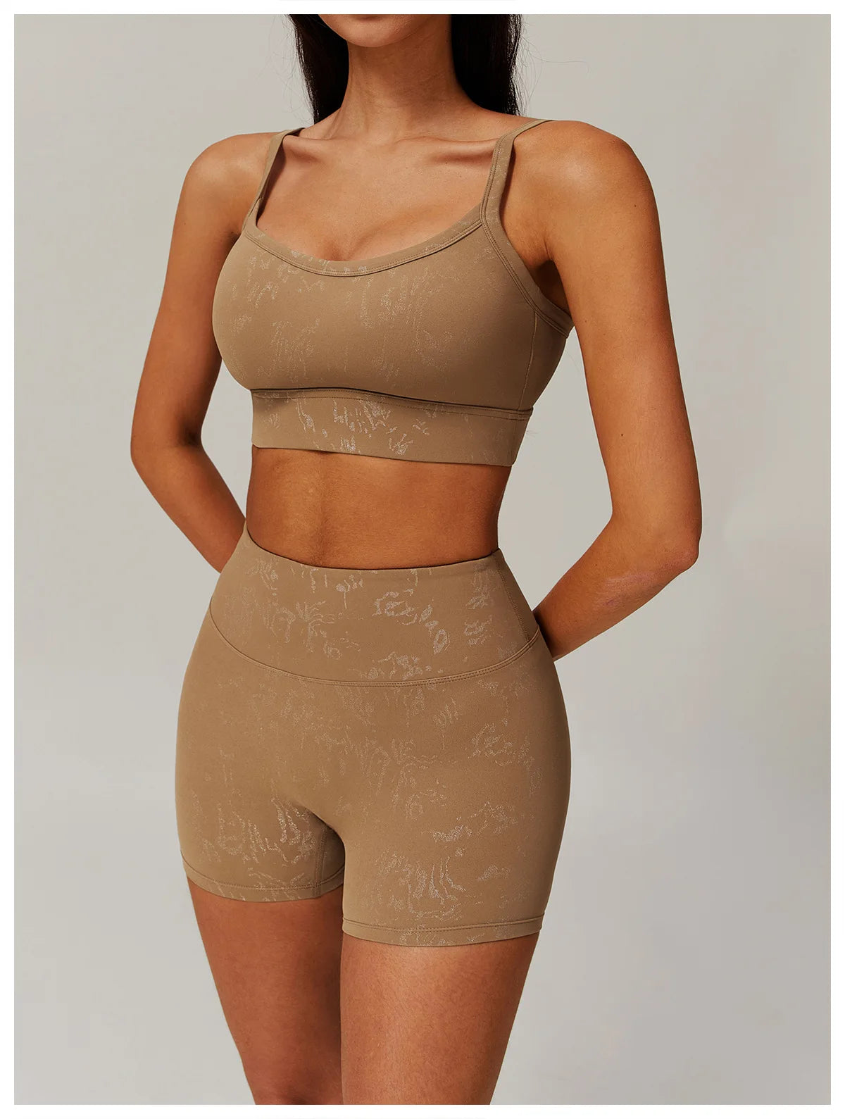 Light brown spaghetti-strap crop top and high-waisted shorts, studio full view set