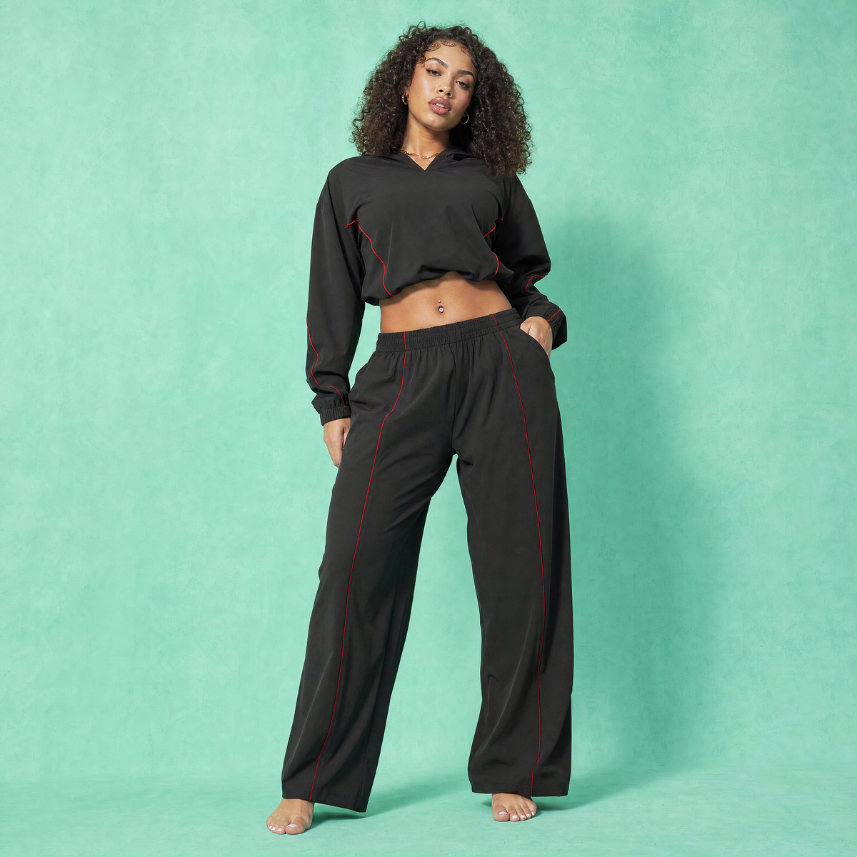 Black baggy crop hoodie and jogger pants set with red contrast stripes