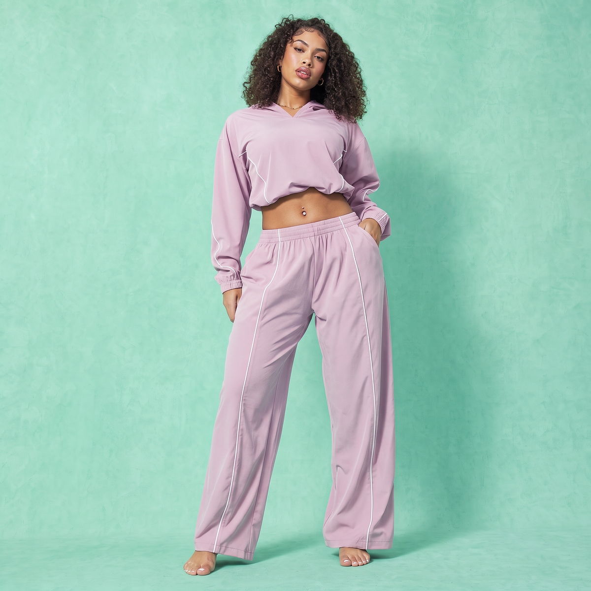 Light mauve baggy crop hoodie and jogger pants set with contrast piping