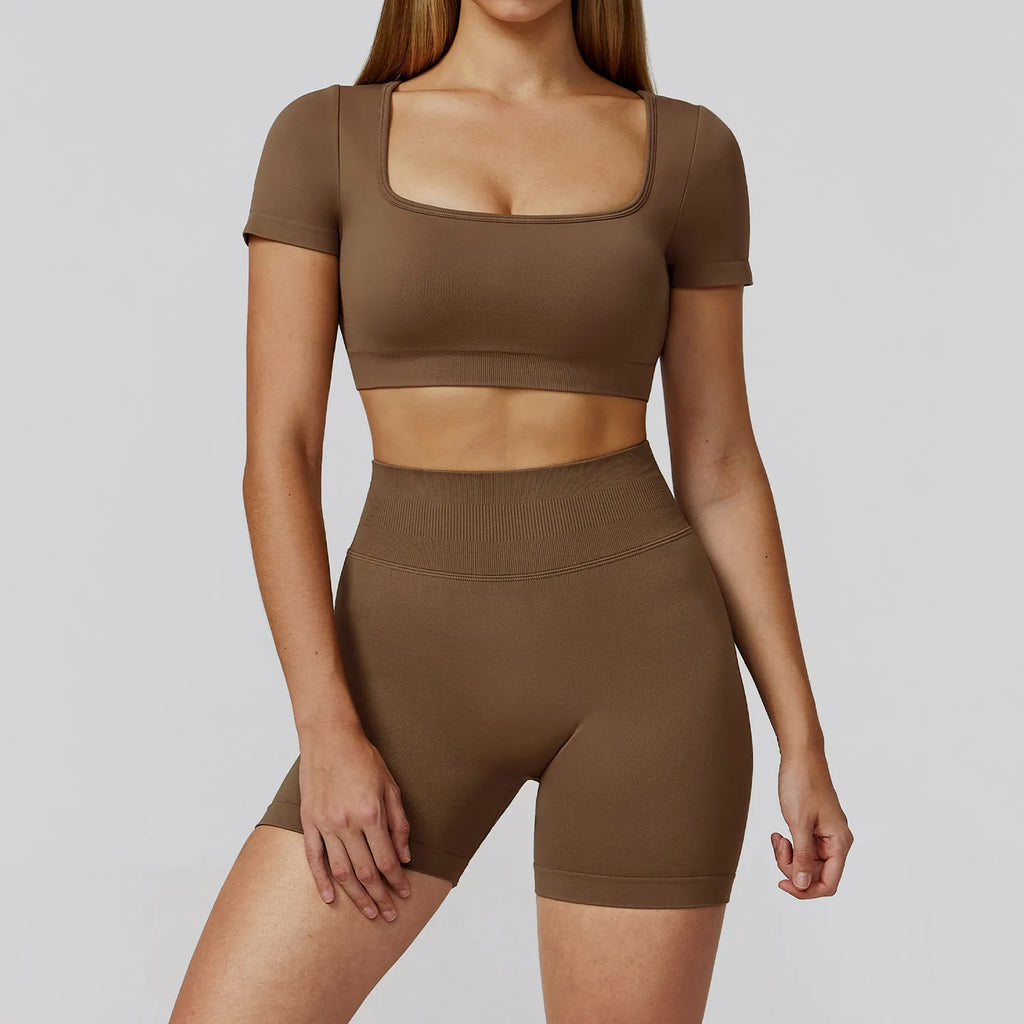 Mocha brown backless crop top and high-waisted shorts matching active set
