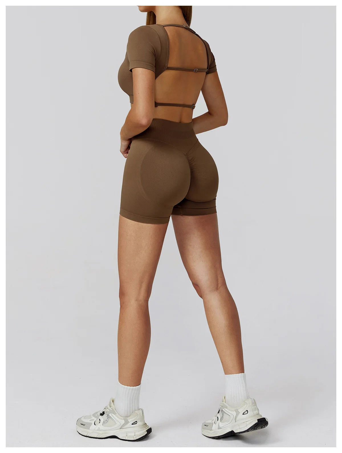 Mocha brown back view: strappy backless crop top and high-waisted shorts