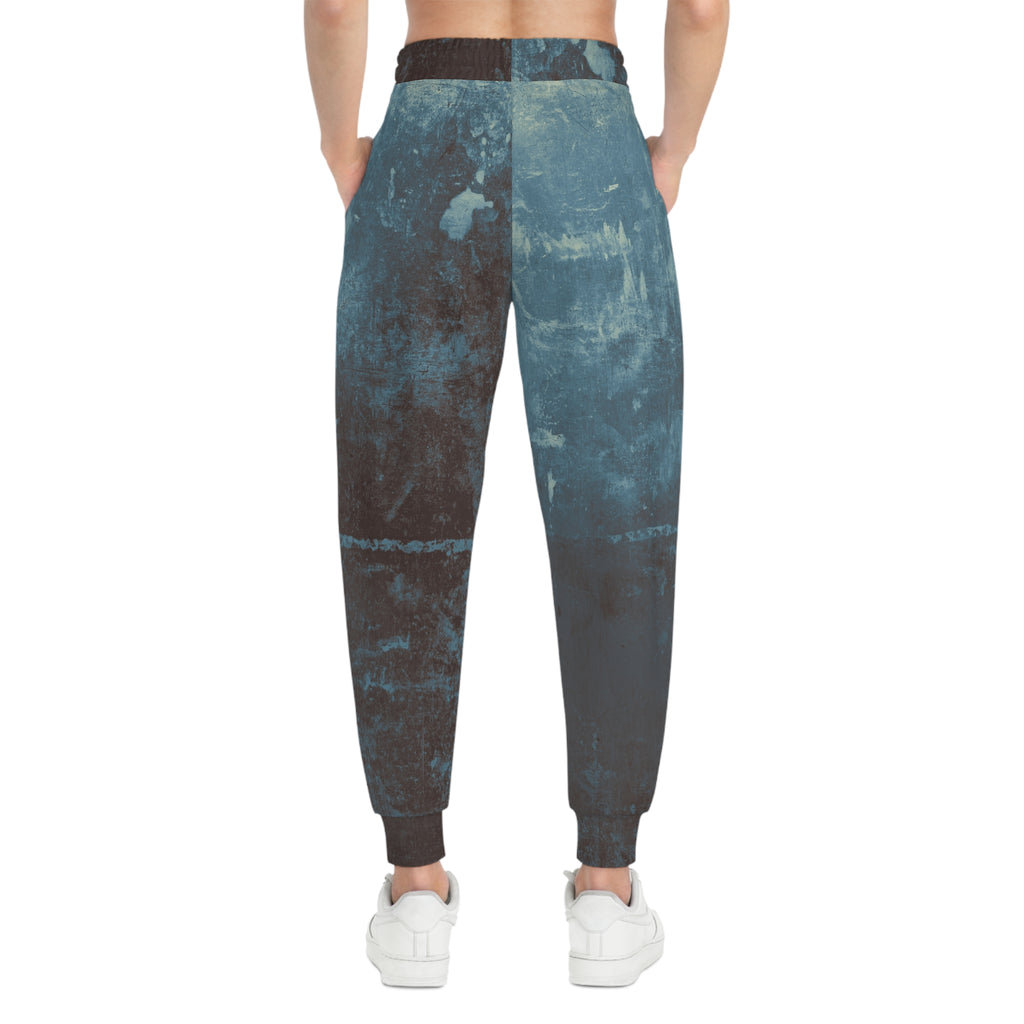 Distressed athletic sweatpants with an all-over blue print and comfortable fit for casual wear
