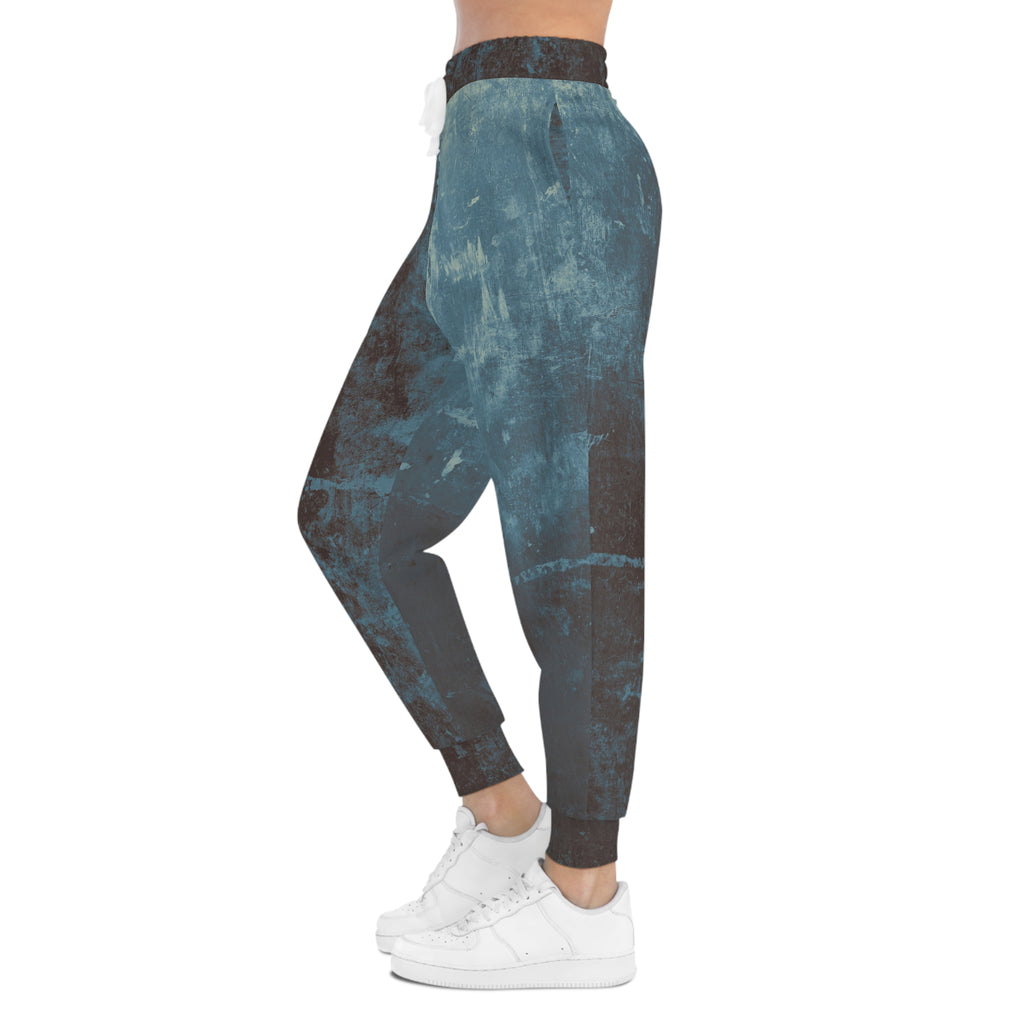 Distressed athletic sweatpants in blue and brown tones for stylish comfort and casual wear