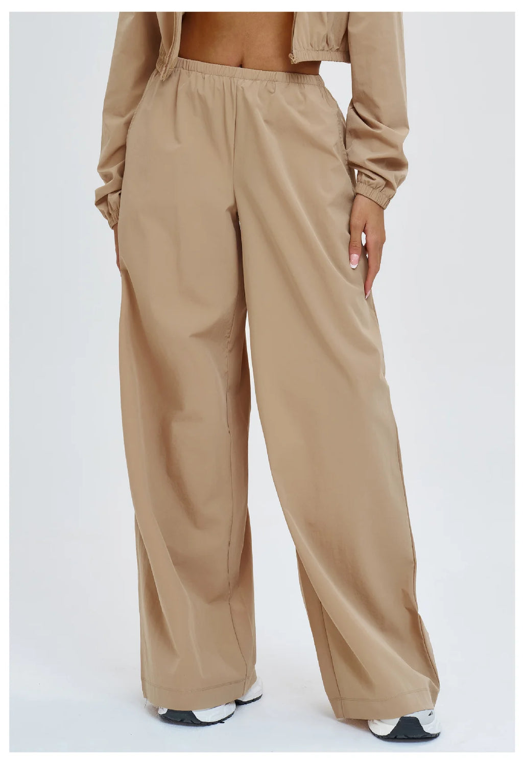 Women’s loose wide-leg yoga pants in latte brown with elastic waistband.