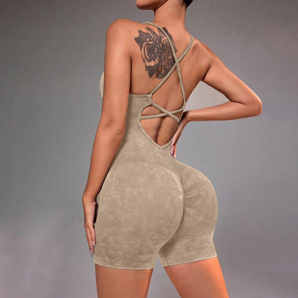 Distressed washed yoga bodysuit with strappy open-back one-piece short, beige
