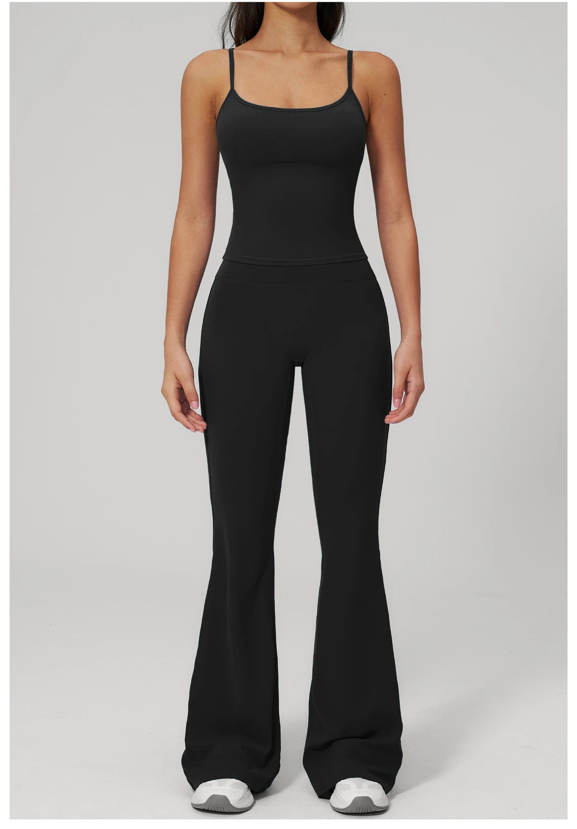 Black sports set: scoop-neck tank bra and wide-leg flare leggings, full front