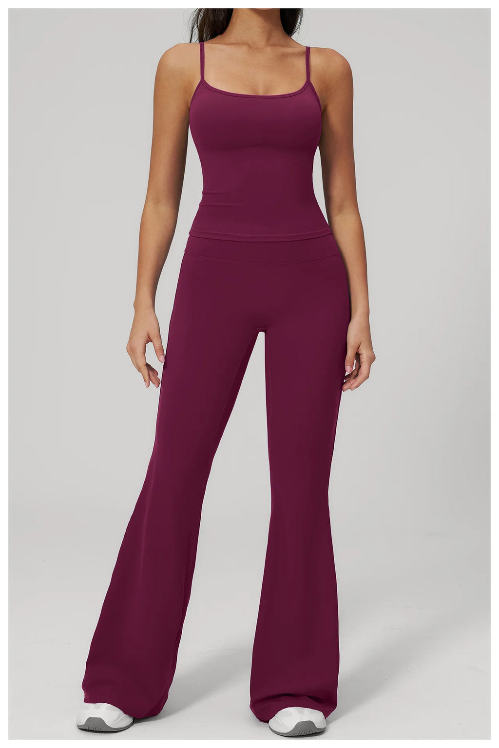 Women's purple sports set, front view: fitted tank top and wide-leg leggings