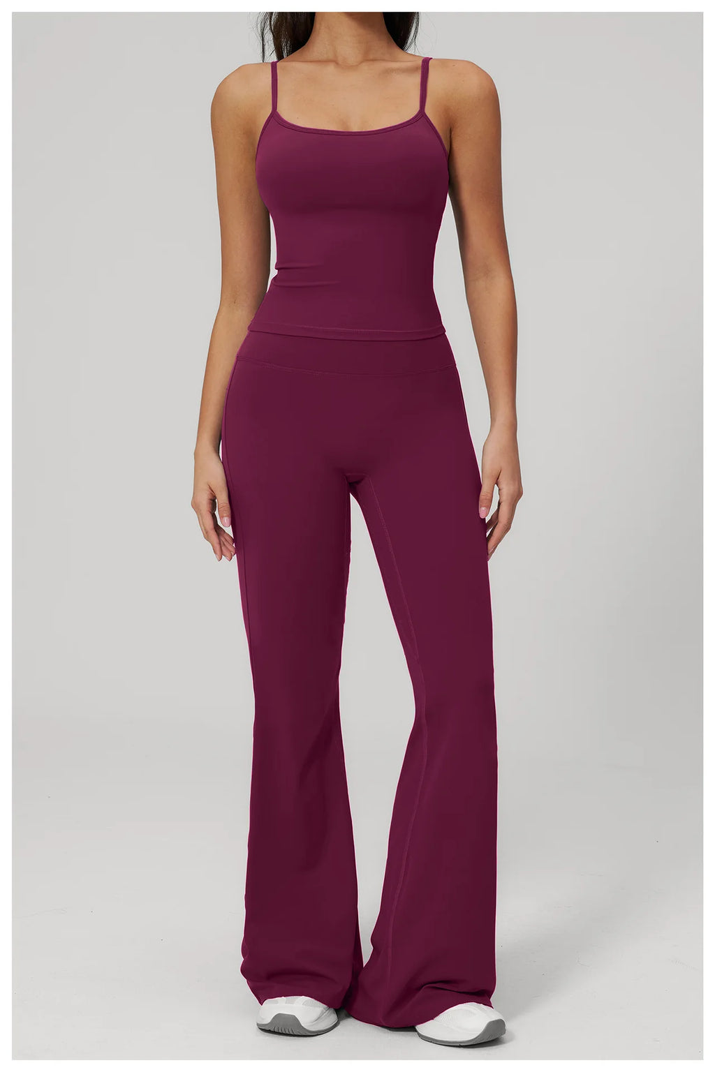 Women's purple sports set, full-length front view: supportive tank and flared leggings