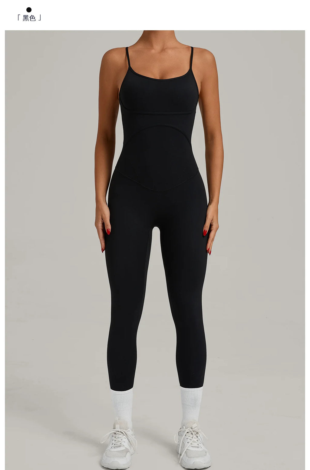 Black yoga jumpsuit with scoop neckline and long capri legs