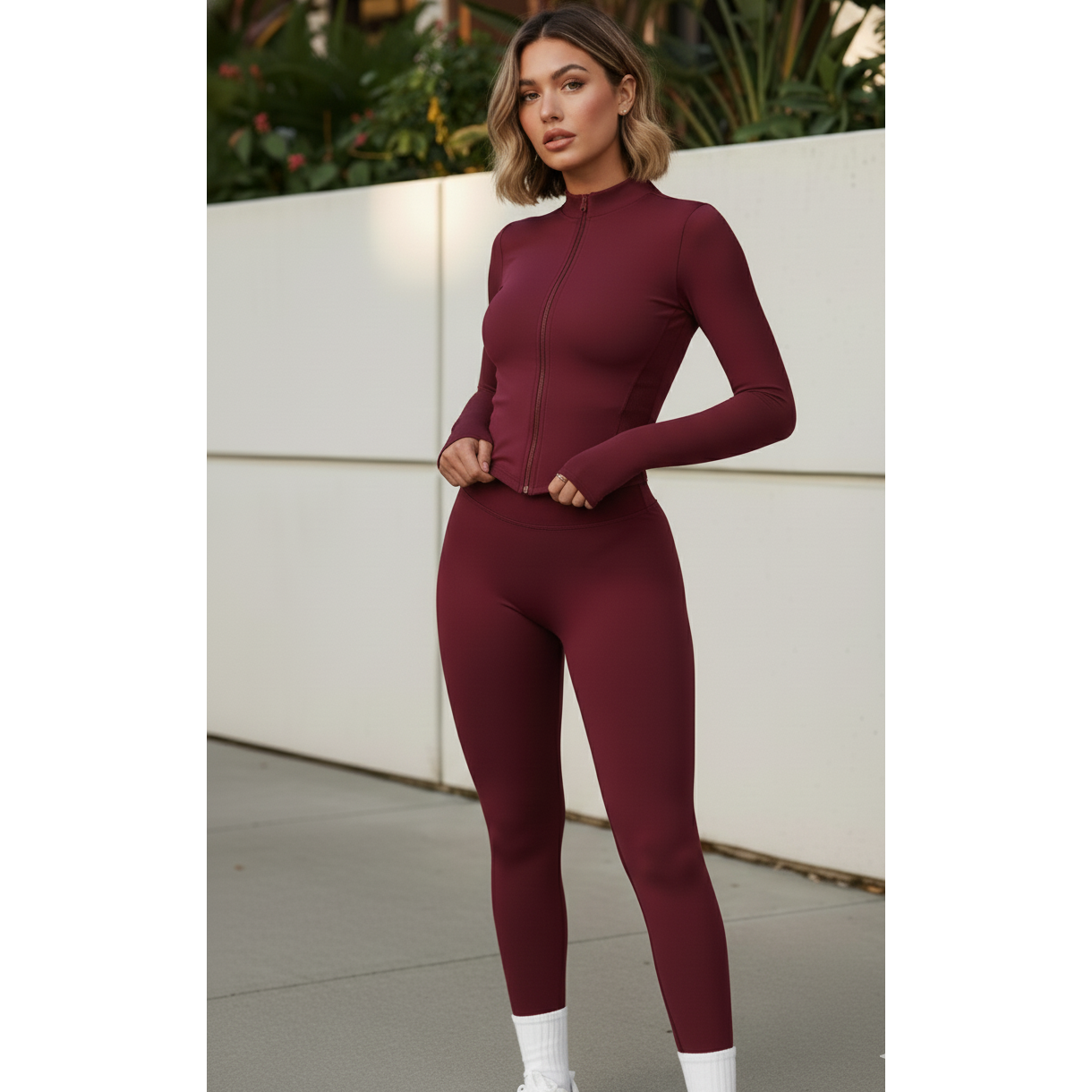 Xooie Fit Two-Piece Set featuring a maroon jacket and leggings fitness outfit for comfortable workouts