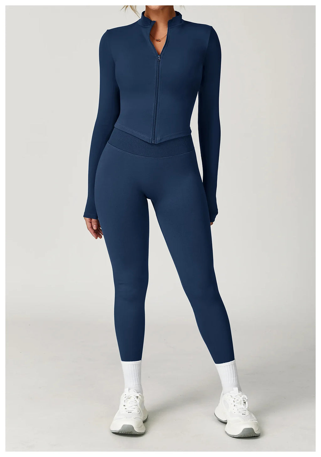 Xooie Fit two-piece set featuring a fitted jacket and leggings fitness outfit in navy blue