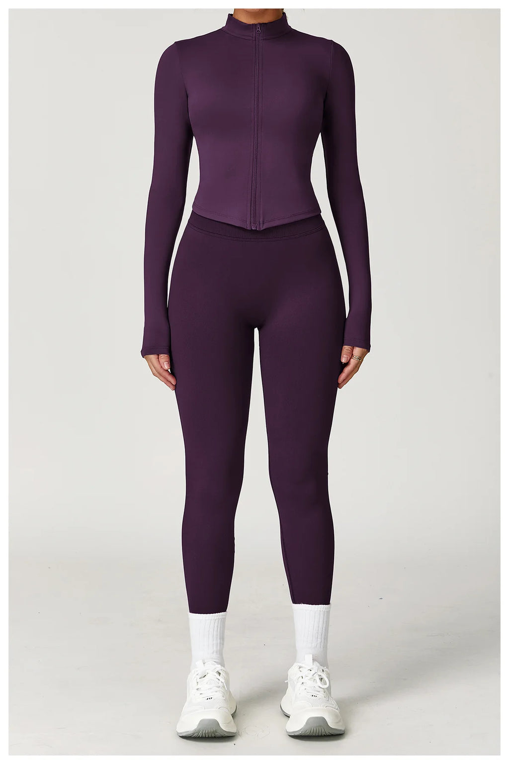 Xooie Fit Two-Piece Set in Deep Purple featuring a fitted jacket and leggings fitness outfit