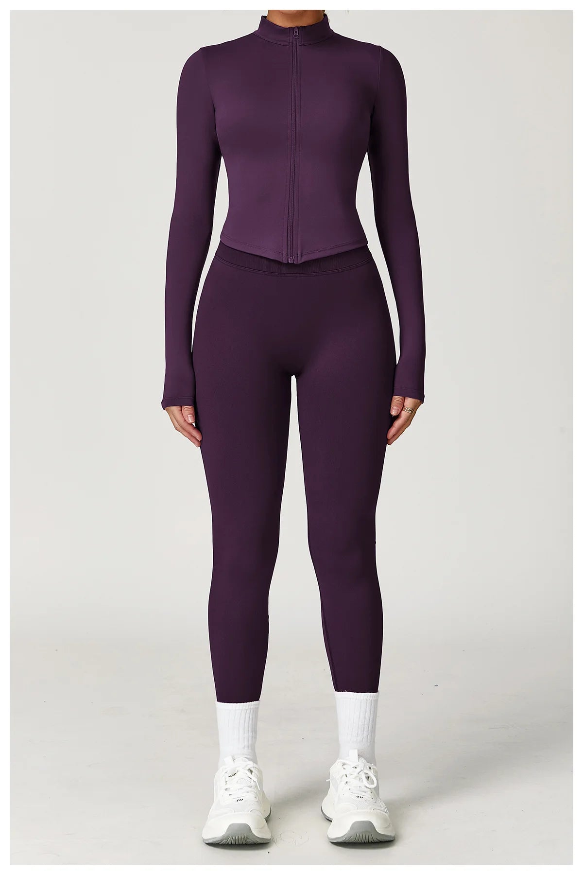 Xooie Fit Two-Piece Set in Deep Purple featuring a fitted jacket and leggings fitness outfit