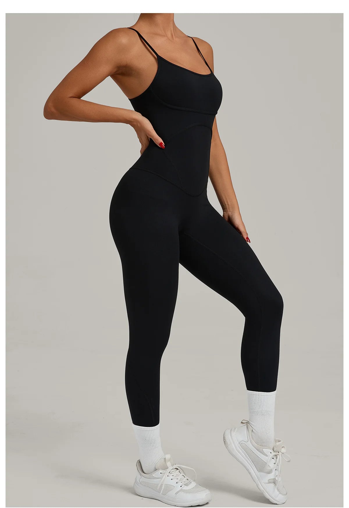 Black yoga jumpsuit with scoop neckline and long capri legs