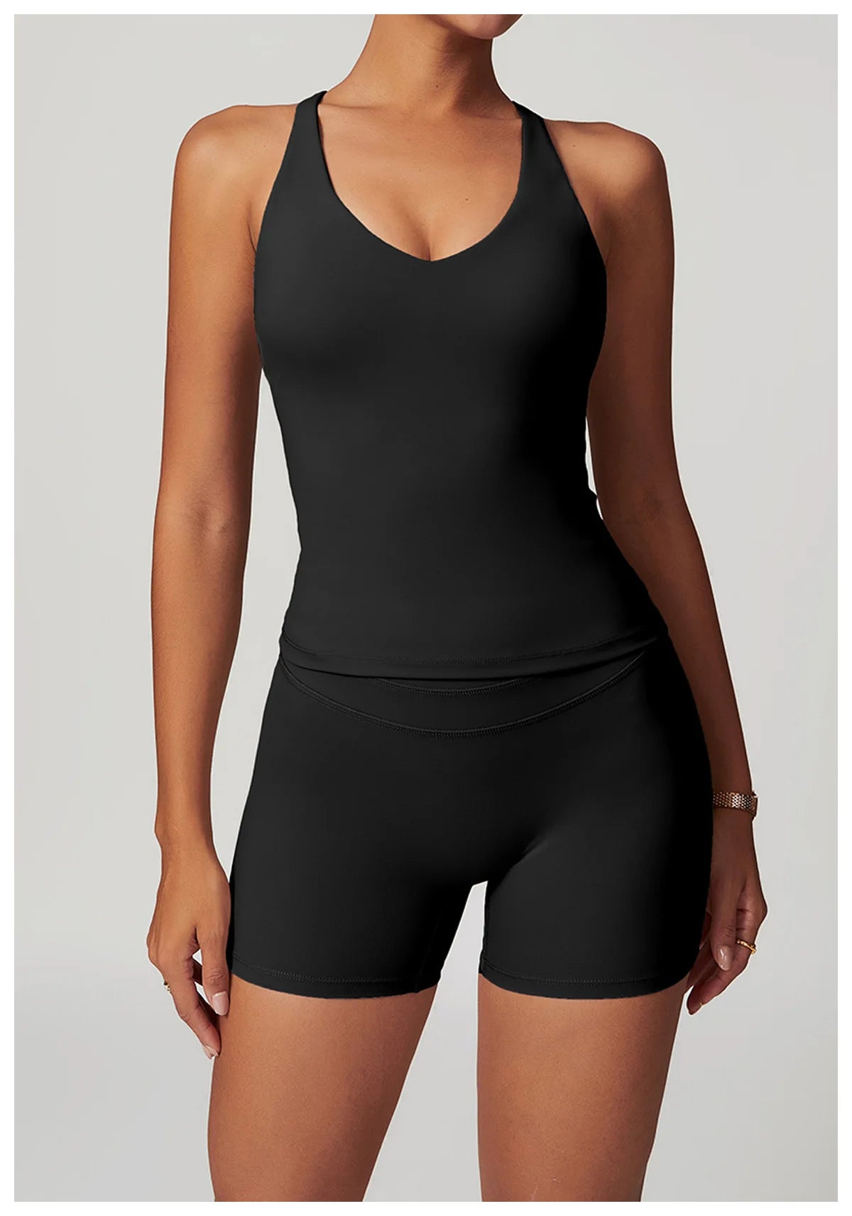 Xooie Fit black fitness tank top and biker shorts set with a fitted design for active wear