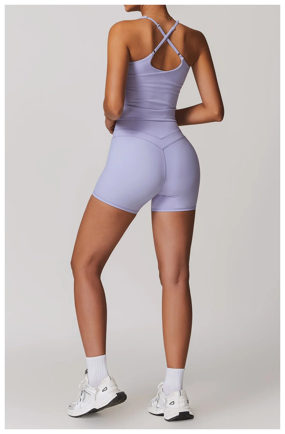Xooie Fit lavender fitness tank top and biker shorts set with crisscross back detail