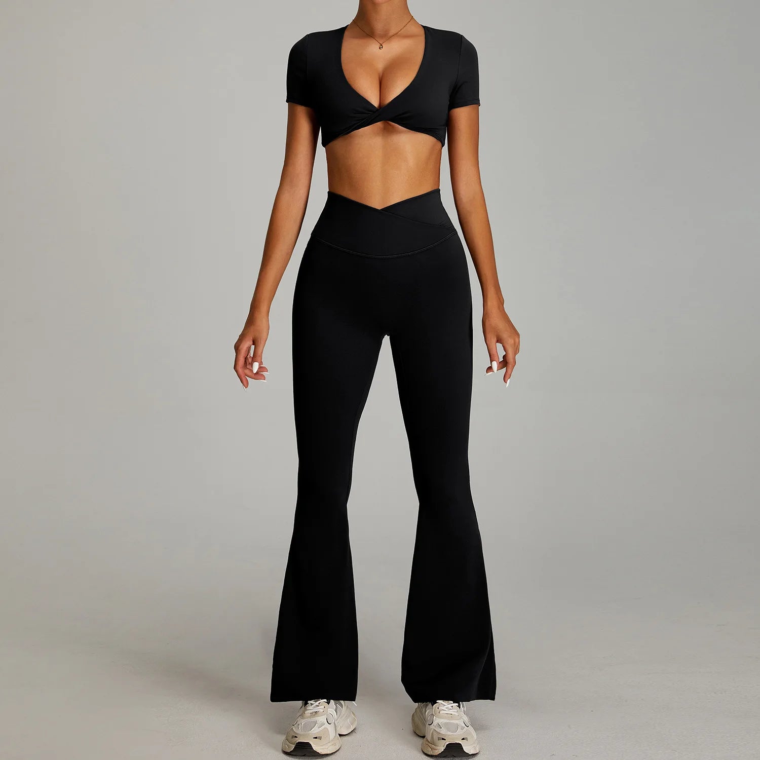 Xooie Fit flare pants matching set for women in black with a stylish cropped top and high-waisted pants