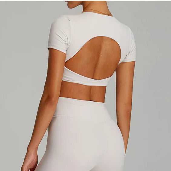 Xooie Fit Women's Two-Piece Set featuring a stylish crop top and flare pants matching set for women