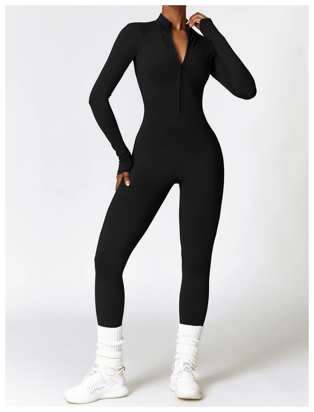 Xooie Fit fleece lined workout jumpsuit women in black with long sleeves and a zip front