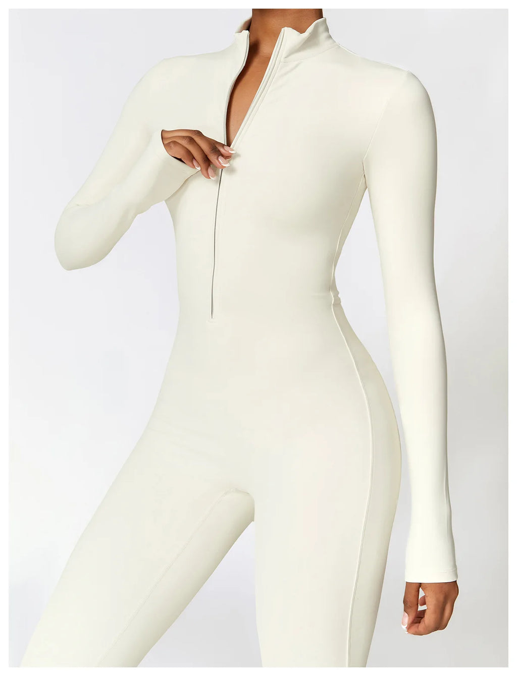 Xooie Fit fleece lined workout jumpsuit women in cream color with a high collar and long sleeves