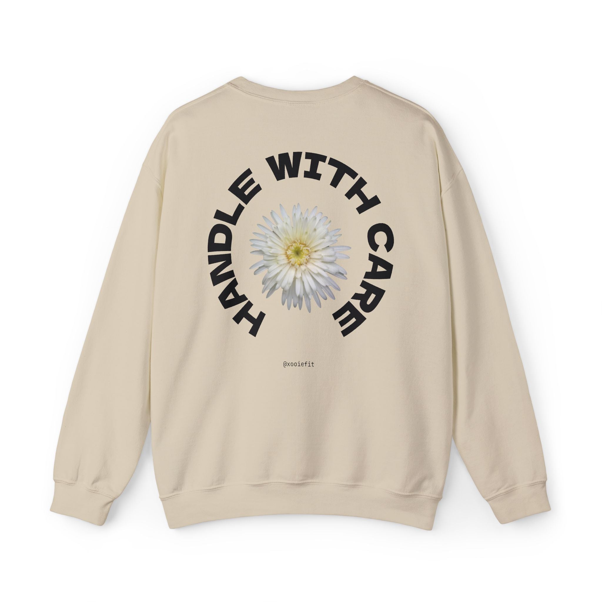 Beige crewneck sweatshirt, back circular daisy graphic with "WITH CARE" text