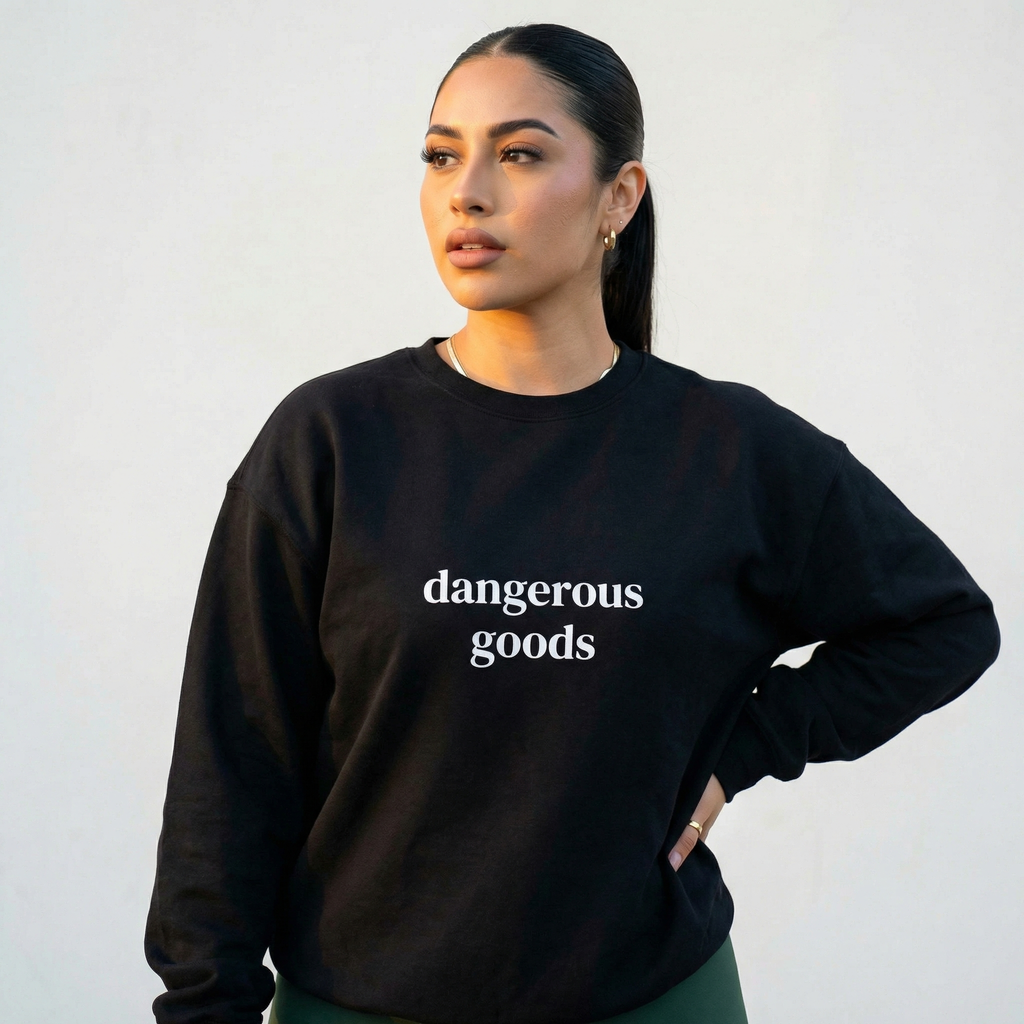 Black crewneck sweatshirt front text "dangerous goods"
