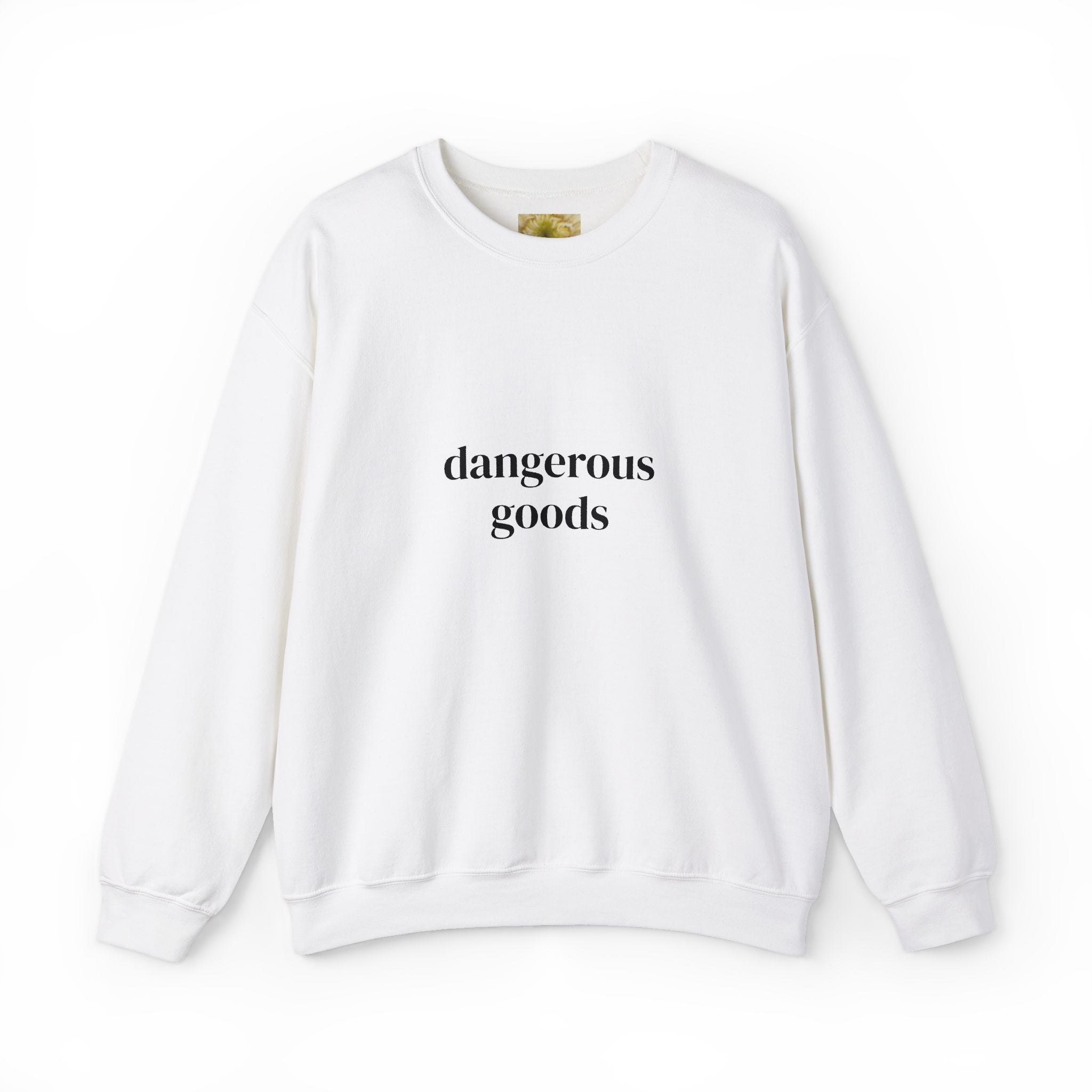White crewneck sweatshirt front, "dangerous goods" text graphic