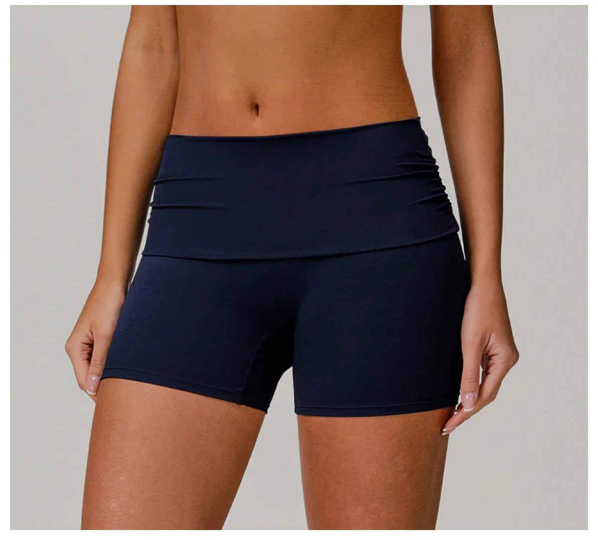 Xooie Fit black foldable waistband yoga shorts for women with comfortable stretchy fabric