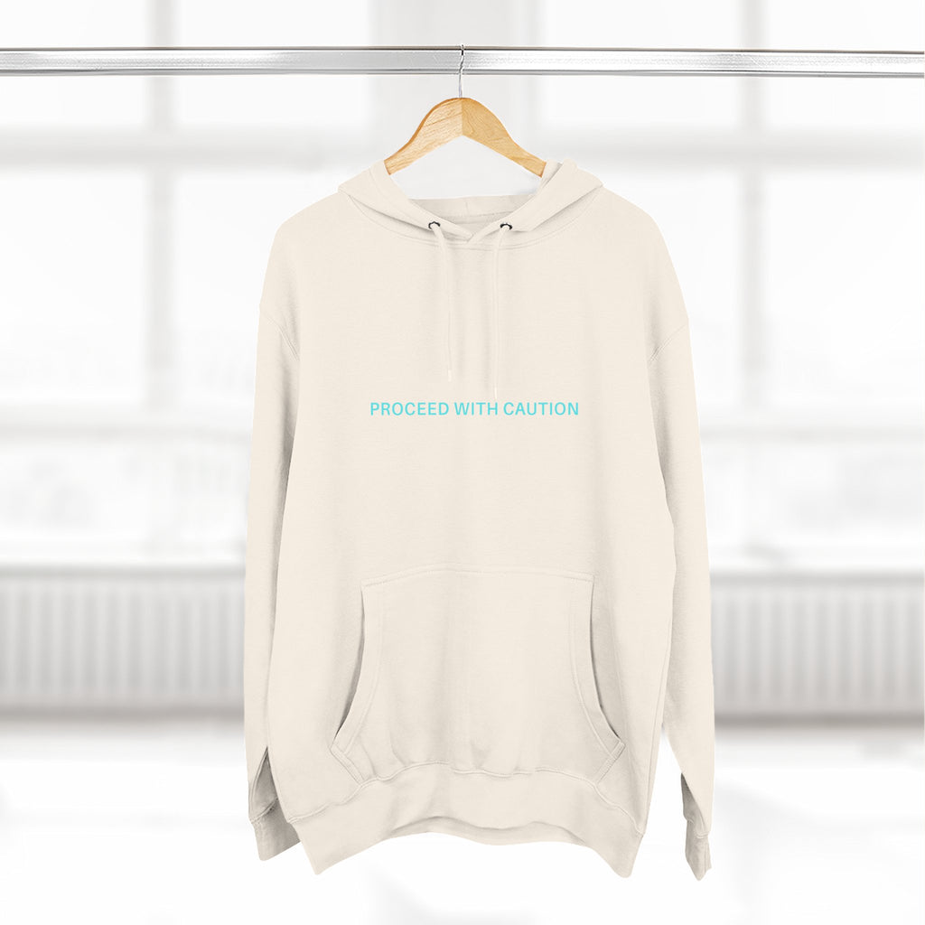 Proceed With Caution hoodie, Off White; front pouch pocket, hood with drawstrings, “PROCEED WITH CAUTION”