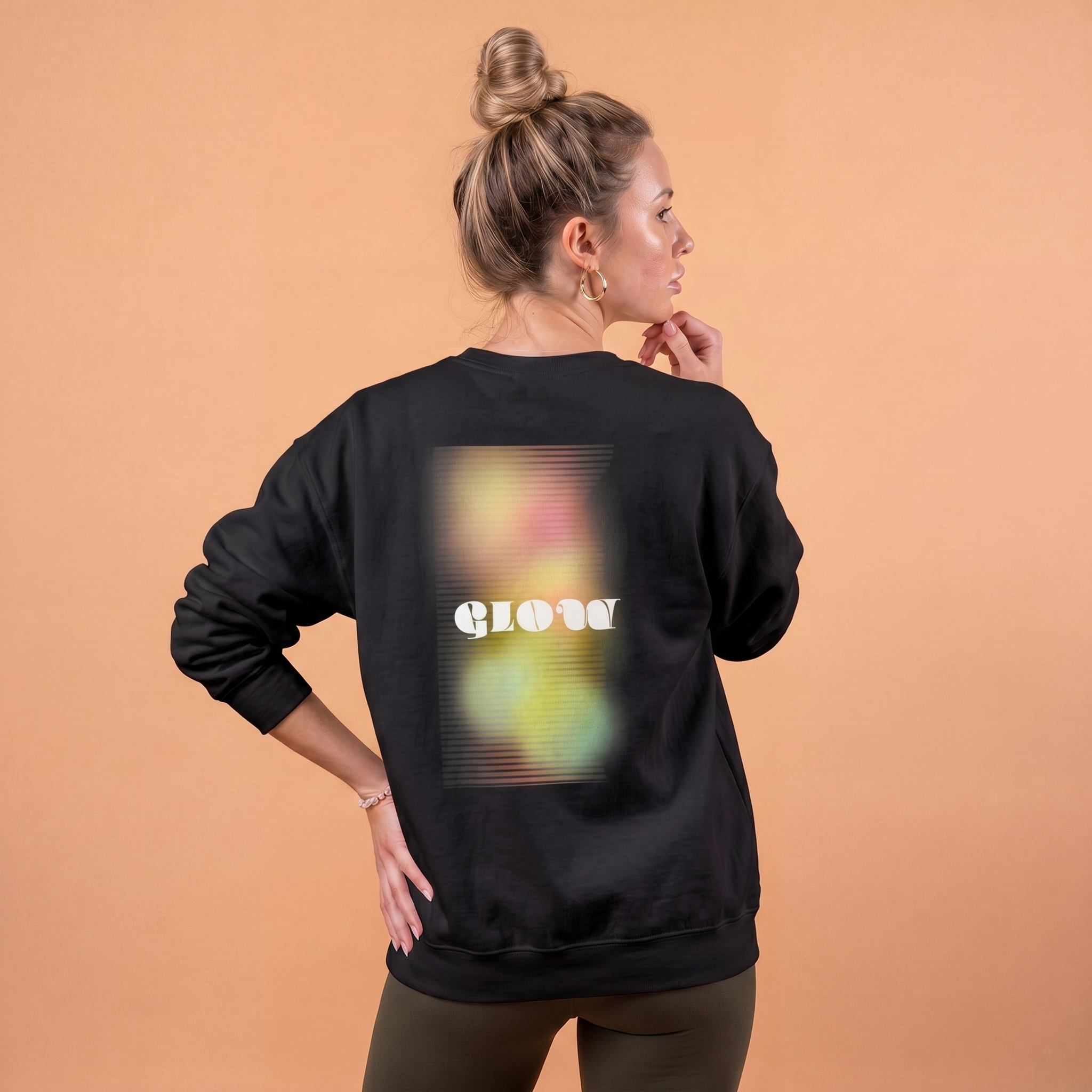 Black graphic sweatshirt with a colorful blurred glow design on the back for a stylish look