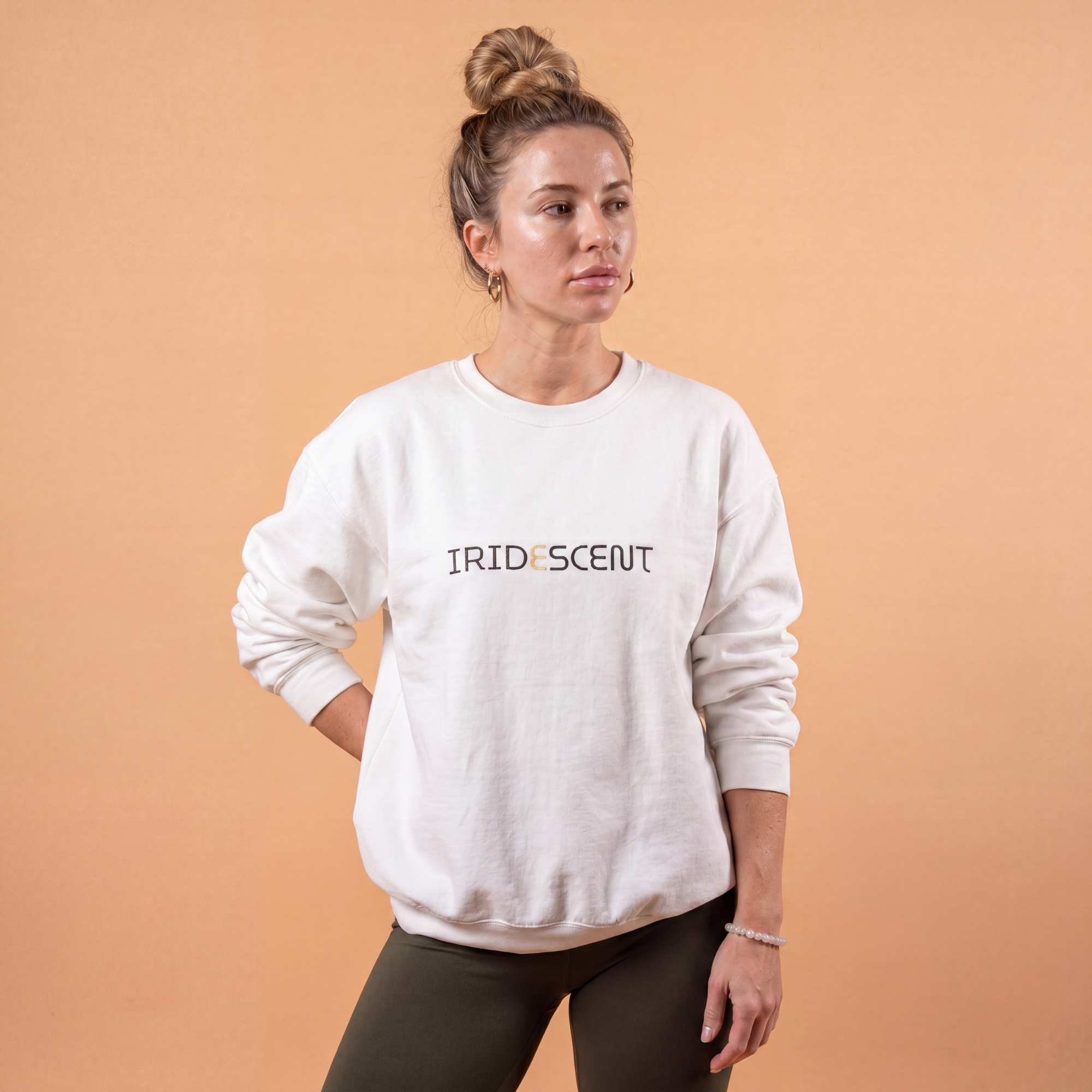 Stylish graphic sweatshirt featuring the word IRIDESCENT in bold letters for a trendy look