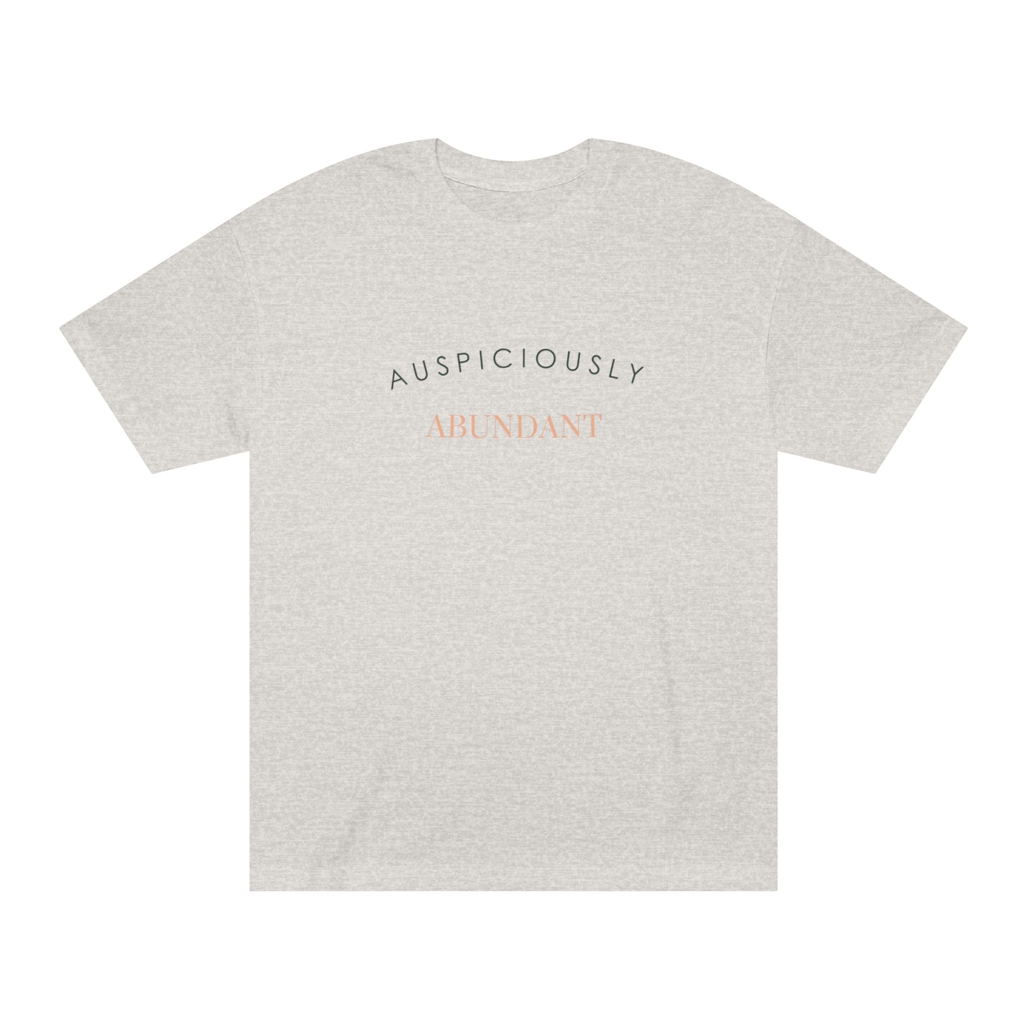 Light grey crewneck T-shirt with “AUSPICIOUSLY ABUNDANT” text graphic on the front.