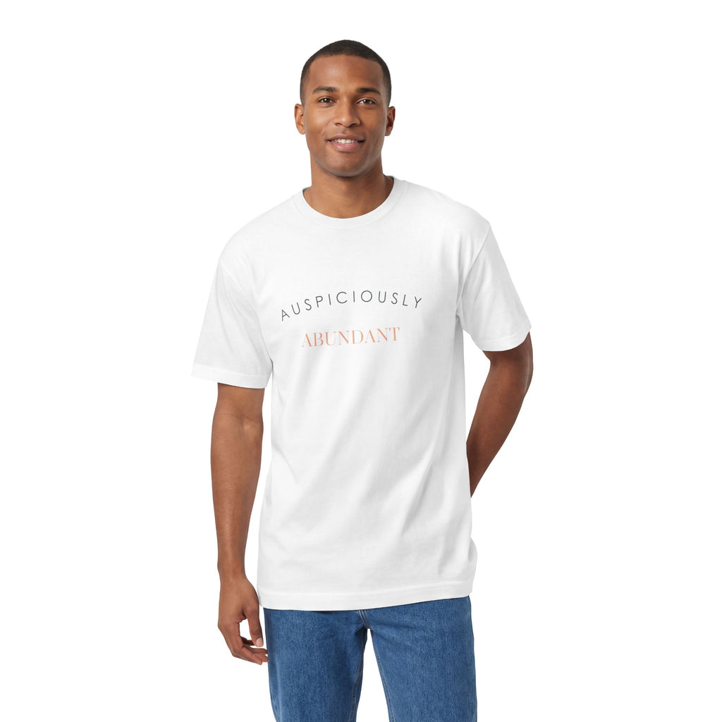 White crewneck tee with gold “Auspiciously Abundant” text graphic on front