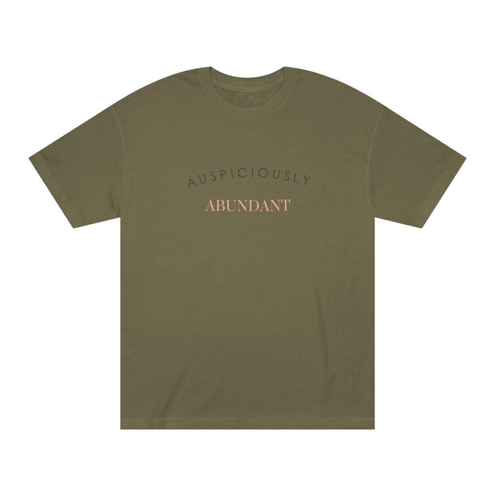 Olive green crewneck T-shirt with “AUSPICIOUSLY ABUNDANT” text graphic on the front.