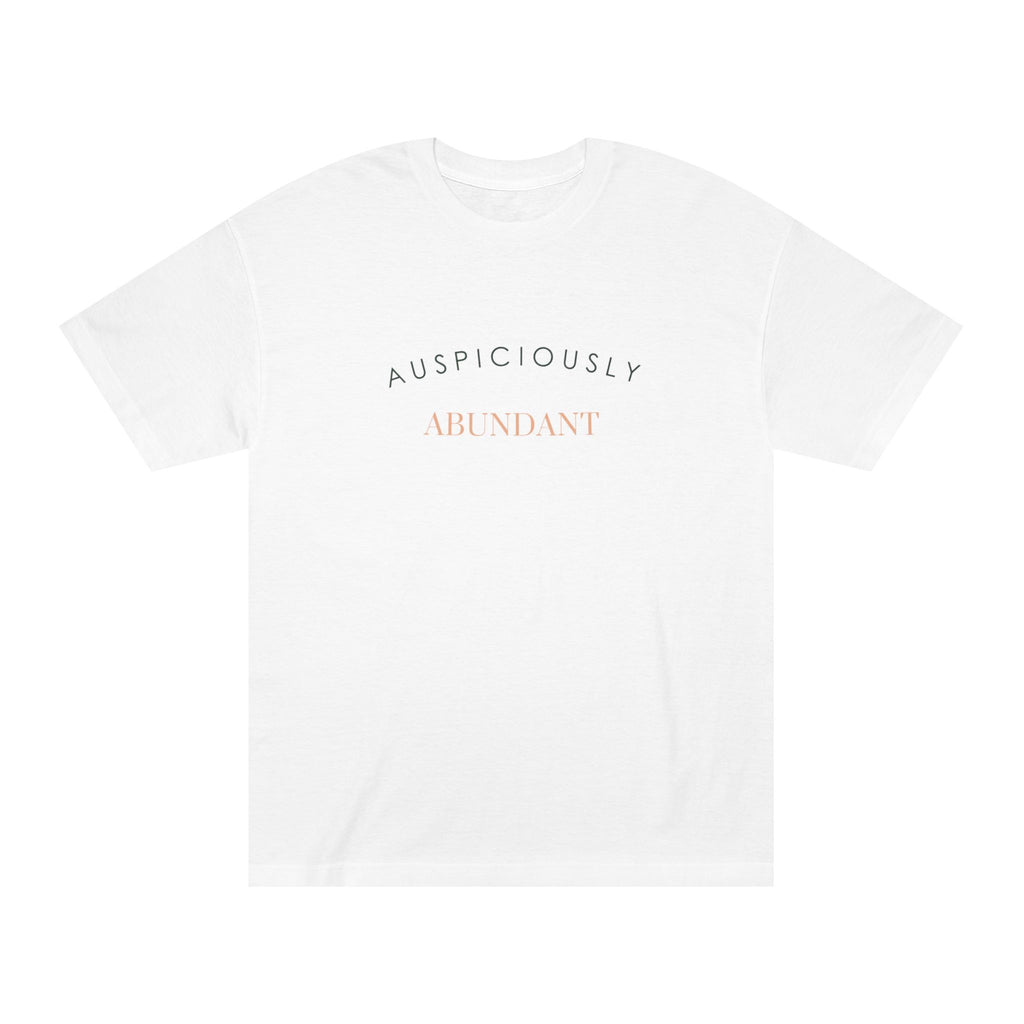 White crewneck T-shirt with “AUSPICIOUSLY ABUNDANT” text graphic on the front.