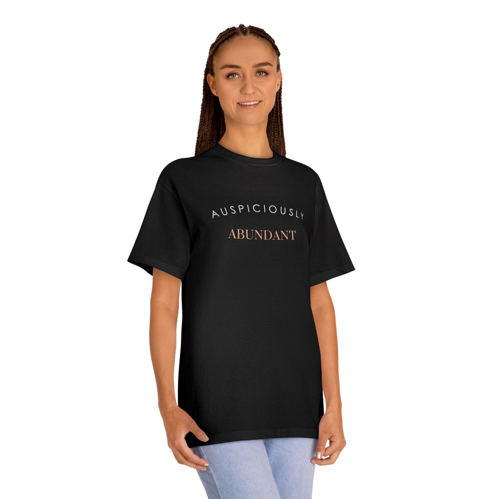 Black crewneck tee with 'Auspiciously Abundant' text graphic across chest