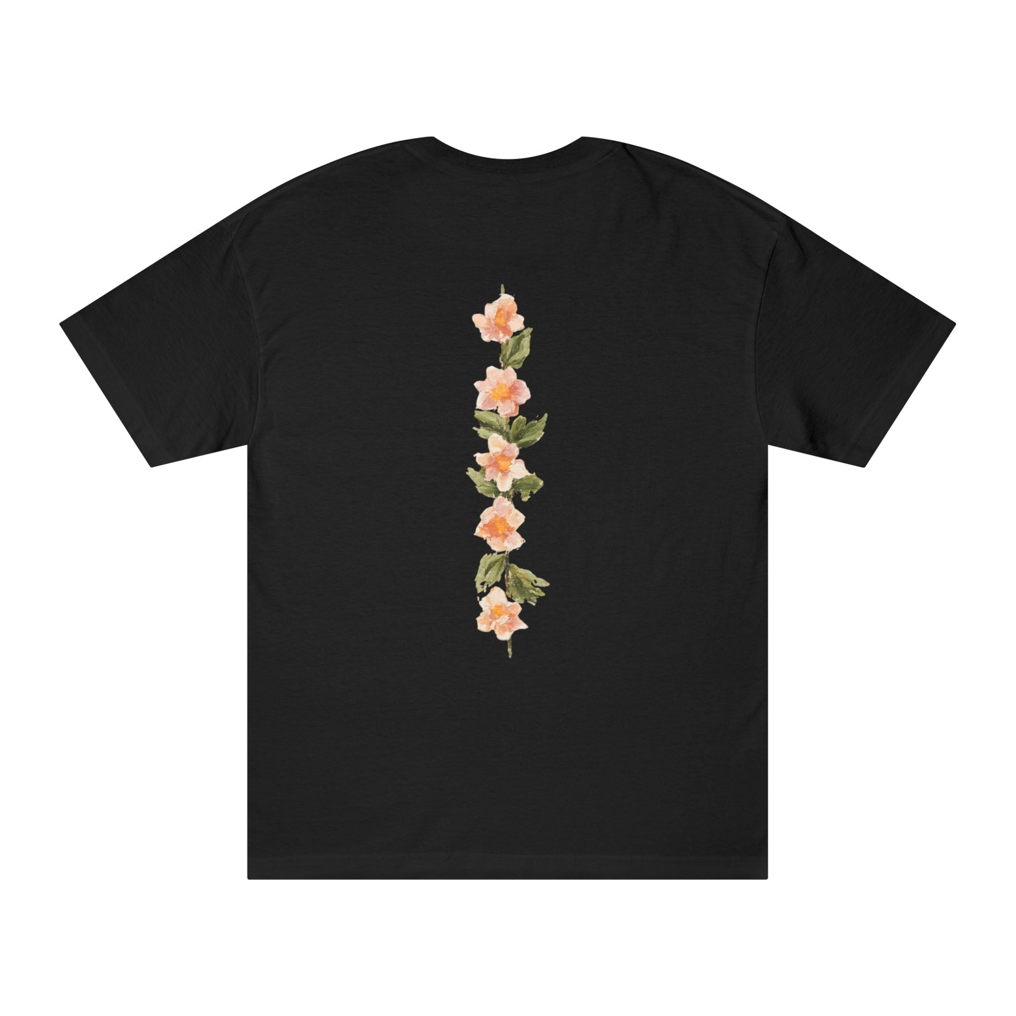 Black crewneck tee with vertical floral back graphic in peach and green