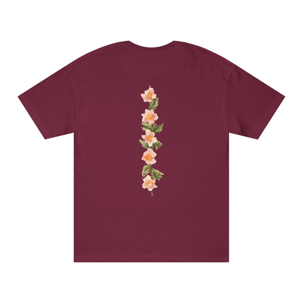 Burgundy crewneck tee with vertical floral back graphic in peach and green