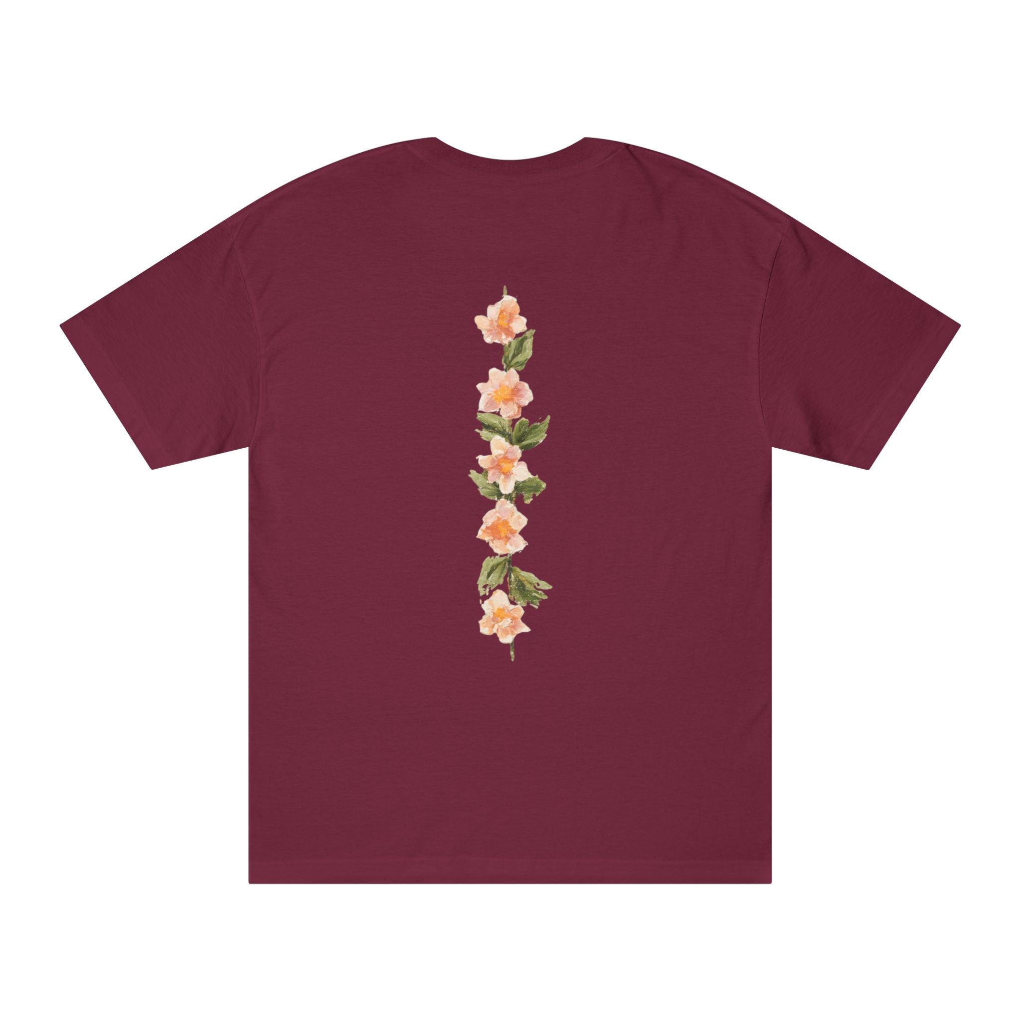 Burgundy crewneck tee with vertical floral back graphic in peach and green