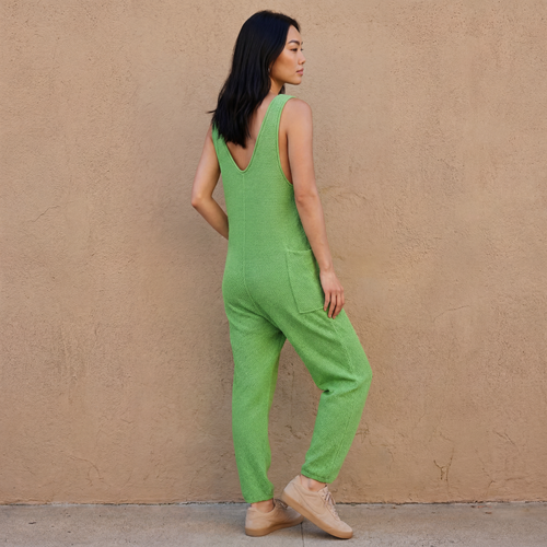 Green knit sleeveless jumpsuit with wide legs and single back pocket