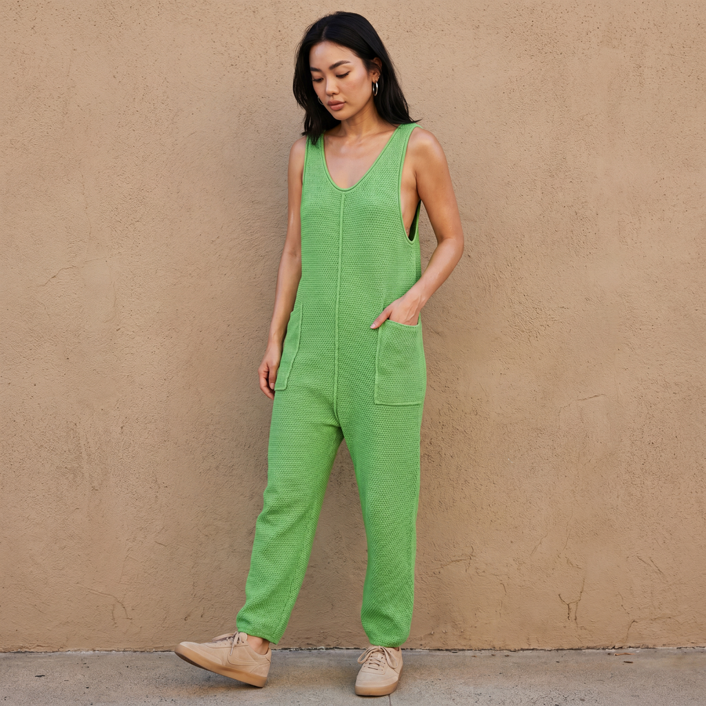 Green knit sleeveless jumpsuit romper with wide legs and front pocket