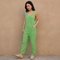 Green knit sleeveless jumpsuit romper with wide legs and front pocket