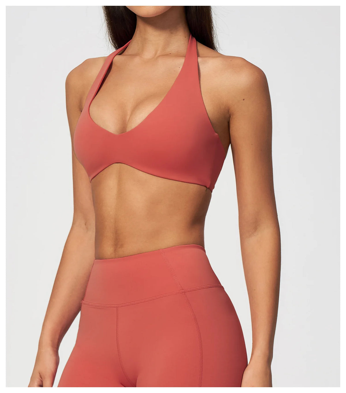 Coral red halter yoga bra with deep V front and smooth racerback
