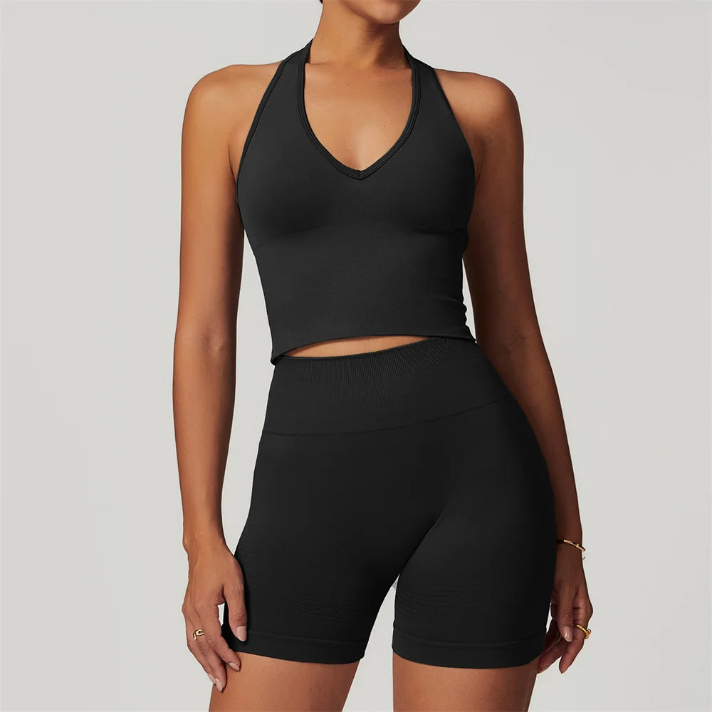 Xooie Fit black halter tank and shorts workout set with fitted design and seamless finish