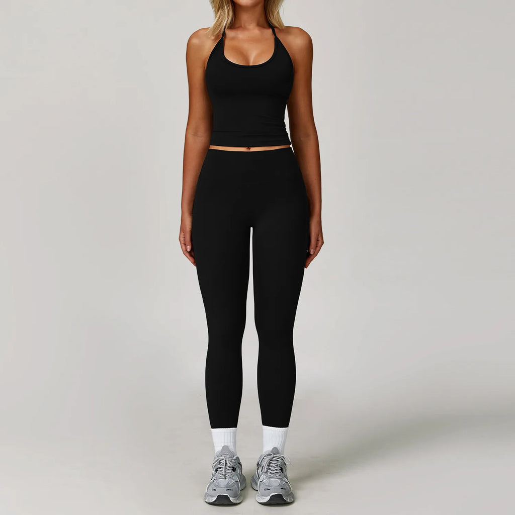 Xooie Fit halter tank top and leggings set in black, perfect for workouts and casual wear