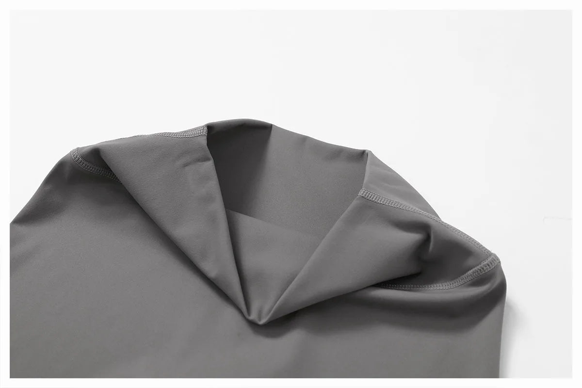 Gray halter tank top and leggings set from Xooie Fit showing close-up of the neckline